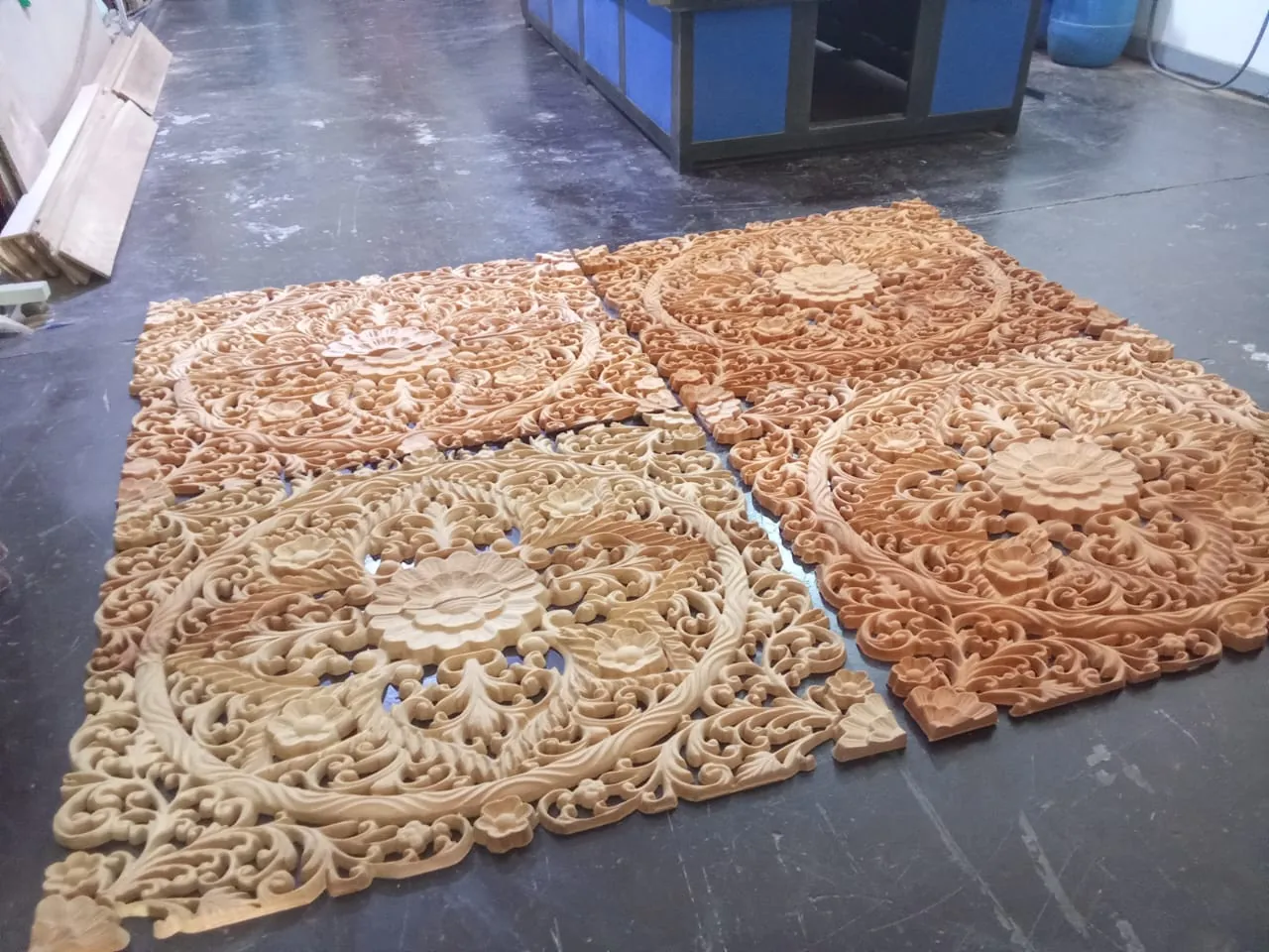 Four CNC carved mahogany decorative panels at the workshop in Kuliyapitiya, Kurunegala
